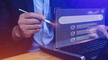 Businessman touching data search box information technology Search Engine Optimization, uses a search box to search for information on the Internet. photo