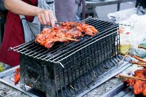 Grilled Chicken Street food in Thai style for sale.chicken BBQ photo