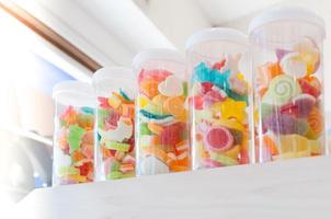 Jelly sweet, flavor fruit, candy dessert colorful on sugar in a jar photo