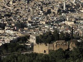 Aerial view panorama of the Fez el Bali medina Morocco. Fes el Bali was founded as the capital of the Idrisid dynasty between 789 and 808 AD. photo