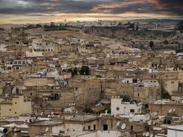 Aerial sunset view panorama of the Fez el Bali medina Morocco. Fes el Bali was founded as the capital of the Idrisid dynasty between 789 and 808 AD. photo