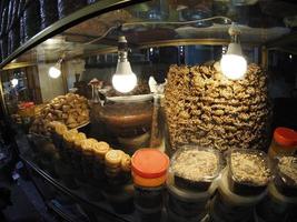 Moroccan biscuits and pastries dipped in honey for sale in the Medina of Fes in Morocco photo