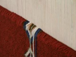 Moroccan handmade carpet at a shop in Medina of Fez, Morocco. photo