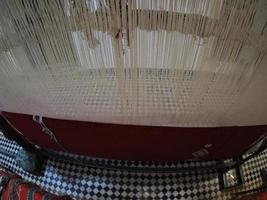 Moroccan handmade carpet at a shop in Medina of Fez, Morocco. photo