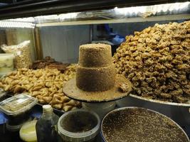 Moroccan biscuits and pastries dipped in honey for sale in the Medina of Fes in Morocco photo