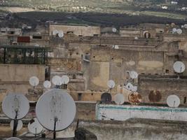 many satellite antennas Aerial view panorama of the Fez el Bali medina Morocco. Fes el Bali was founded as the capital of the Idrisid dynasty between 789 and 808 AD. photo