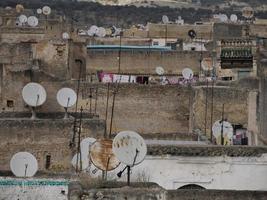 many satellite antennas Aerial view panorama of the Fez el Bali medina Morocco. Fes el Bali was founded as the capital of the Idrisid dynasty between 789 and 808 AD. photo