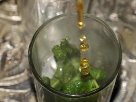 Moroccan mint tea served in the traditional way in a glass from a silver teapot old ritual photo