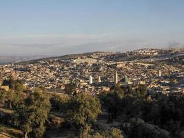 Aerial view panorama of the Fez el Bali medina Morocco. Fes el Bali was founded as the capital of the Idrisid dynasty between 789 and 808 AD. photo