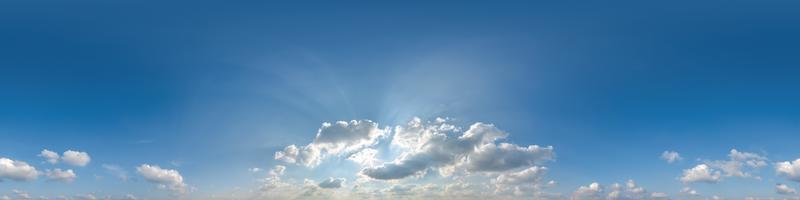 blue sky with clouds as seamless hdri 360 panorama with zenith in spherical equirectangular projection format use for sky replacement in 3d graphics visualization or drone shots or game development photo