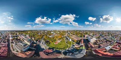 aerial full seamless spherical hdri 360 panorama view from great height on red roofs of historical center of old big city  in equirectangular projection. May use like sky replacement for drone shots photo