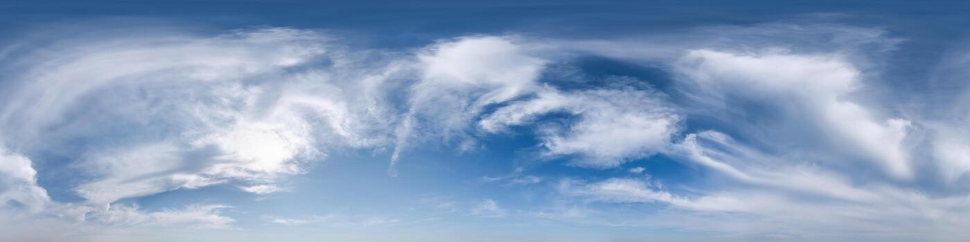 blue sky with clouds as seamless hdri 360 panorama with zenith in spherical equirectangular projection format use for sky replacement in 3d graphics visualization or drone shots or game development photo