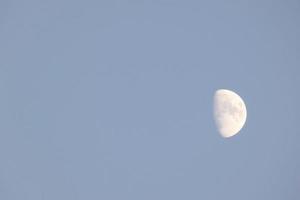 Phase of the crescent moon seen by day photo