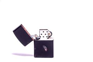 Cigarette lighter on white background photo