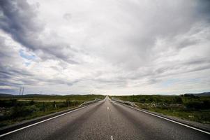 Scenic road view in Sweden photo