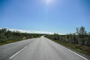 Scenic road view in Sweden photo
