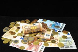 Euro banknotes and coins photo