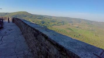 Video of a walk on the historic city walls of the Croatian town of Motovun during the day