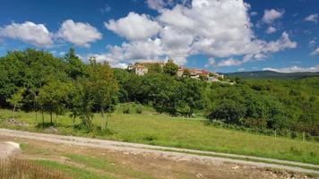 Vertical axis video of the historical worlds smallest city Hum in Croatia during daytime