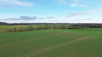 Aerial video of a drone flying over agricultural land in northern Germany.