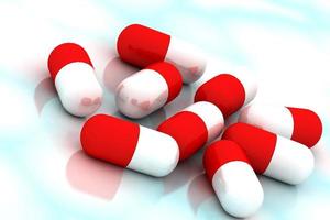 3d multi use red and white pill in color background photo