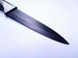 steel kitchen knifes, black knife. isolated on white background photo
