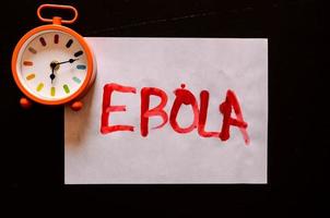 Ebola sign on black background photo