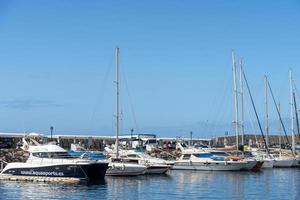 PUERTO DE MOGAN, GRAN CANARIA, CANARY ISLANDS - MARCH 7. View of the marina in Puerto de Mogan Gran Canaria on March 7, 2022. Unidentified people photo