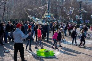 London, UK. Bubblemaker on the Southbank of the Thames photo