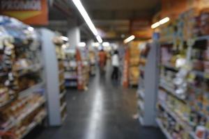 Abstract blurred of alley interior in a market, with bokeh light background. photo