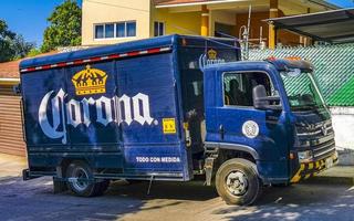 Puerto Escondido Oaxaca Mexico 2023 Mexican Corona beer trucks cargo transporter delivery cars in Mexico. photo