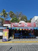 Puerto Escondido Oaxaca Mexico 2023 Scenic view tourist street palm city Zicatela Puerto Escondido Mexico. photo