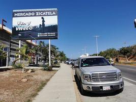 Puerto Escondido Oaxaca Mexico 2023 Busy road street driving cars traffic jam Puerto Escondido Mexico. photo