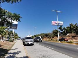 Puerto Escondido Oaxaca Mexico 2023 Busy road street driving cars traffic jam Puerto Escondido Mexico. photo