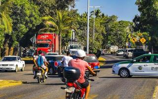 Puerto Escondido Oaxaca Mexico 2023 Busy road street driving cars traffic jam Puerto Escondido Mexico. photo