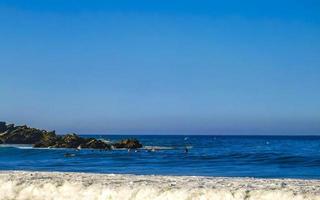 Extremely huge big surfer waves beach La Punta Zicatela Mexico. photo