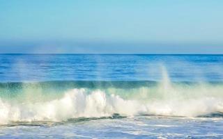 Extremely huge big surfer waves at beach Puerto Escondido Mexico. photo