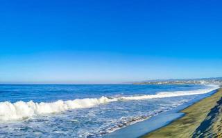 Extremely huge big surfer waves at beach Puerto Escondido Mexico. photo