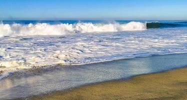 Extremely huge big surfer waves at beach Puerto Escondido Mexico. photo