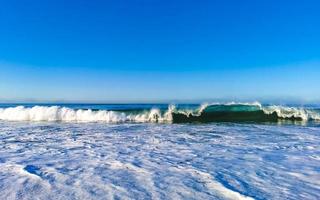 Extremely huge big surfer waves at beach Puerto Escondido Mexico. photo