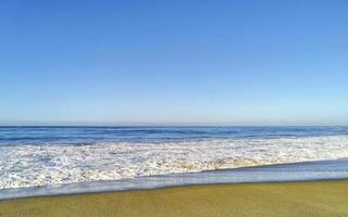 Extremely huge big surfer waves at beach Puerto Escondido Mexico. photo