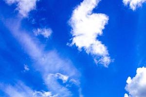 Beautiful fluffy clouds in blue sky in Germany. photo