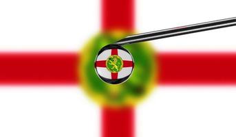 Vaccine syringe with drop on needle against national flag of Alderney background. Medical concept vaccination. Coronavirus Sars-Cov-2 pandemic protection. National safety idea. photo