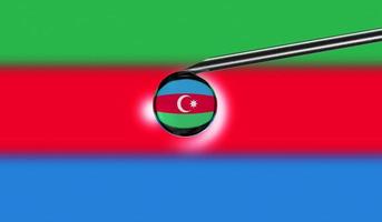 Vaccine syringe with drop on needle against national flag of Azerbaijan background. Medical concept vaccination. Coronavirus Sars-Cov-2 pandemic protection. National safety idea. photo