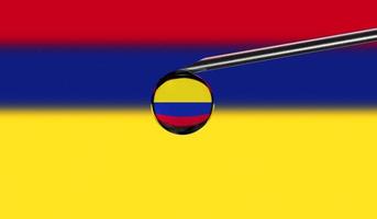 Vaccine syringe with drop on needle against national flag of Colombia background. Medical concept vaccination. Coronavirus Sars-Cov-2 pandemic protection. National safety idea. photo