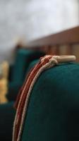 Close up of red and white rope on blue background. Selective focus. photo