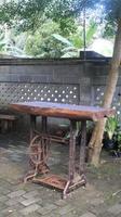 Old rusty wooden table in the garden, selective focus. photo