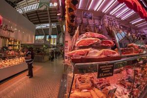 VALENCIA, SPAIN - MAY 3 2022 - The historic market full of customers photo