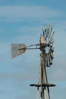 farm old windmill  for water photo