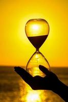 Hourglass over the sunset photo